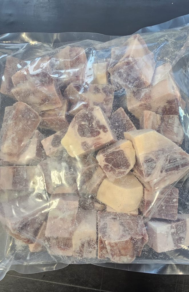 Frozen Cow Tail Oxtail meat for slow cooked stews Kings Table Produce Calgary.